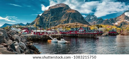 Panorama of A - village, Moskenes, on the Lofoten in northern Norway. Norwegian fishing village, with the typical rorbu houses.  Mountain In Background