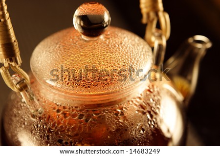 Teapot with fresh earl grey tea