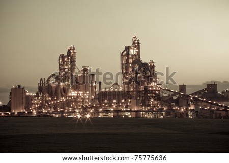 Chemical plant at night - Sepia Toned Modern factory.