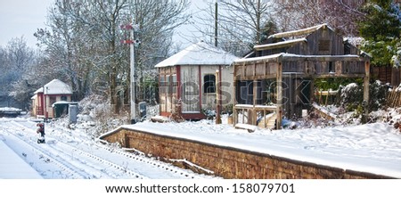 Old disused railway station in the snow