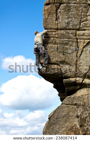 Single man Rock climbing