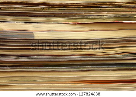 Magazines stack close-up, abstract background