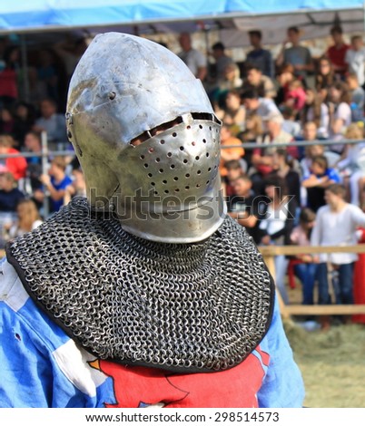 Medieval knight in iron armor closeup