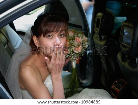 Beautiful bride in wedding car, before wedding ceremonial, summer, Siberia