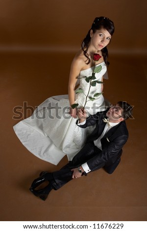 Stock Photo Bride And Groom Posing In Studio After Wedding Ceremony