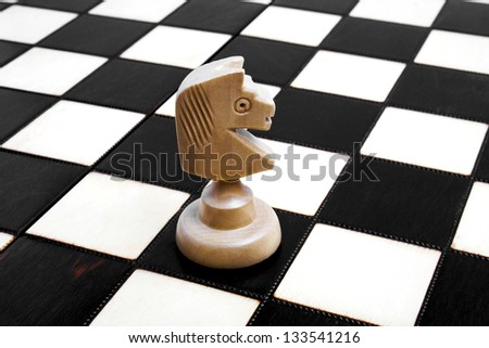 Chess horse isolated on chess board