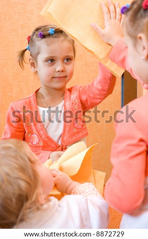 Housework two little girl cleaning mirror