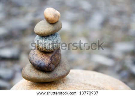 Zen like stones stack on the big stone