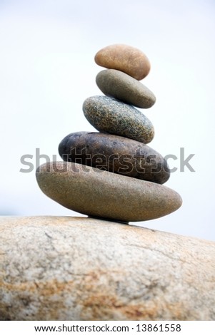 Zen like stones stack on the big stone