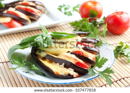 Baked eggplant with cheese and tomato, aubergine,