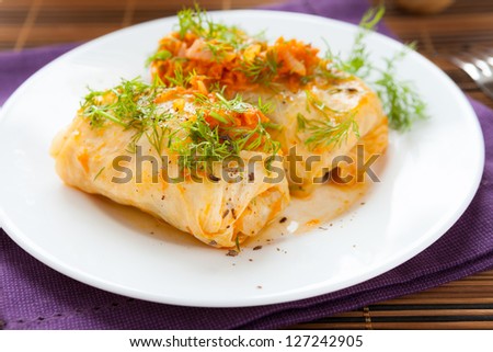 cabbage rolls with rice, tomato sauce, closeup