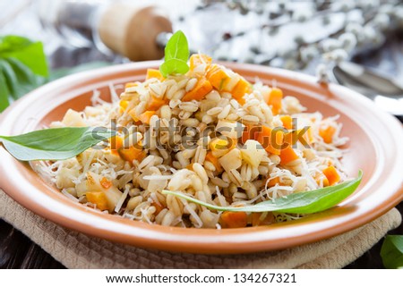 barley porridge on a plate useful for health, food closeup