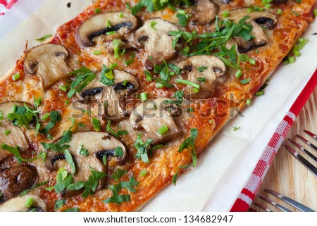 pita baked with sauce and mushrooms, food