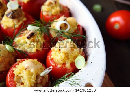 baked stuffed tomatoes in baking dish, food