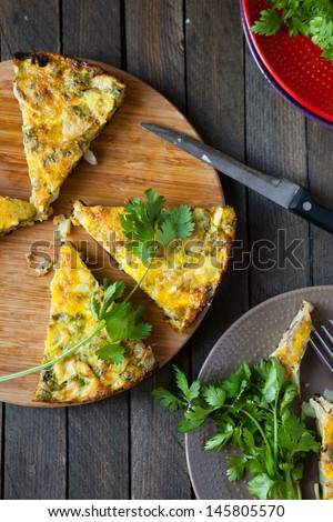 Frittata pieces on the board, top view
