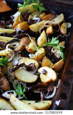 fried potato slices with mushrooms, food
