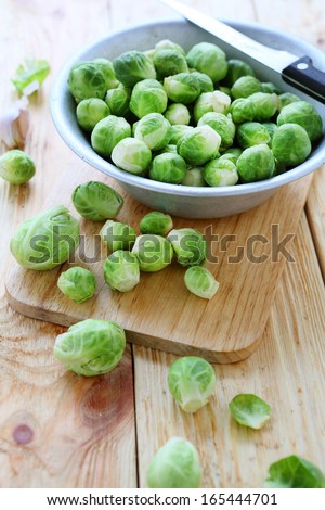 raw brussels sprouts in a bowl, food