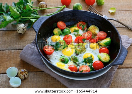 fried eggs with vegetable mix, rustic food