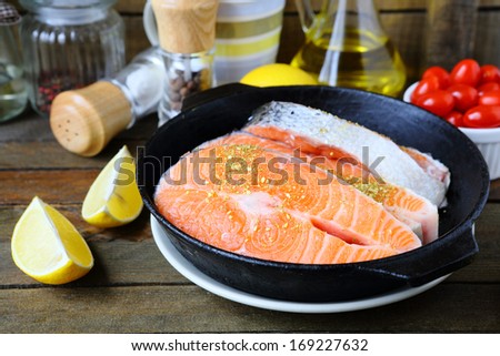 pieces of red fish in the pan, salmon food closeup