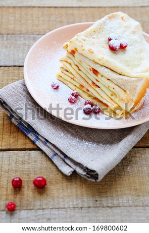 stack of pancakes with berries, food closeup