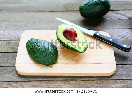 sliced Ã?Â¢??Ã?Â¢??avocado on a blackboard, food closeup