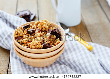 bowl of granola and chocolate chips, food closeup