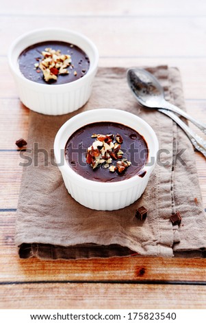 chocolate pudding with nuts, food closeup