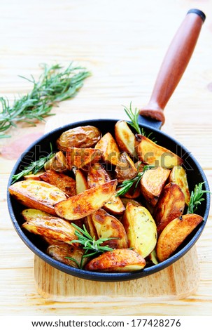 potato wedges with rosemary, food closeup