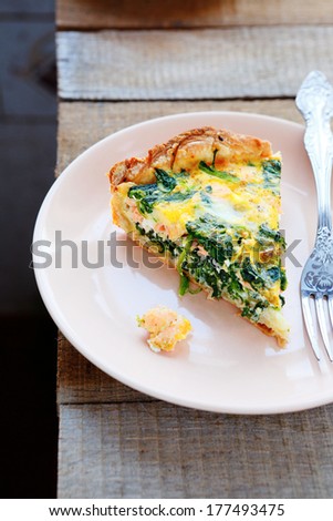rustic quiche with salmon, food closeup