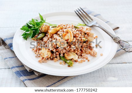 Buckwheat porridge with mushrooms fried, food