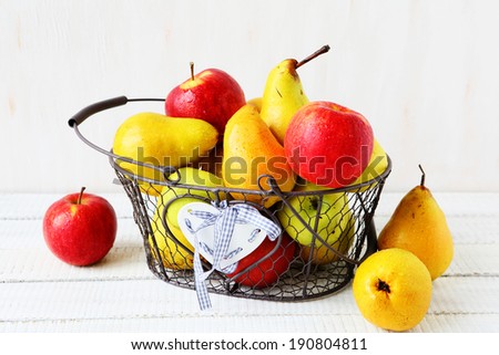 apples and pears in a basket, food closeup