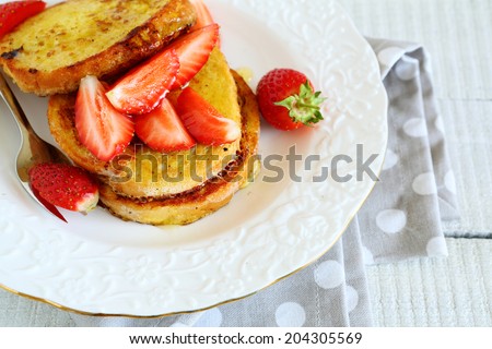 stack of toast with honey and strawberries, food