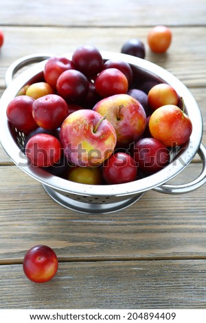 plum and cherry plum in drops of water, food closeup
