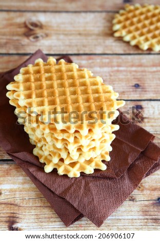 stack of thin and crispy waffles, food closeup