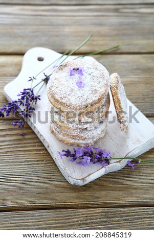 stack shortbread cookies and lavender flowers, food closeup