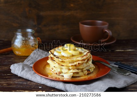 stack of pancakes with honey, food closeup