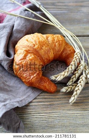 Fresh French croissant, food closeup