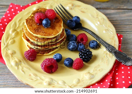 Pancakes with raspberries and blueberries, healthy food