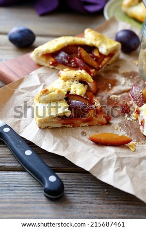 slices of pie with plums, side view