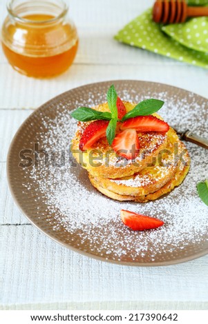 Toast with honey and powdered sugar, top view