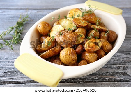 Baked potatoes in a bowl, food close-up