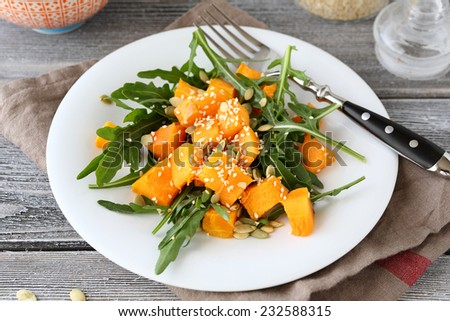 Light salad with baked pumpkin, vegetarian food