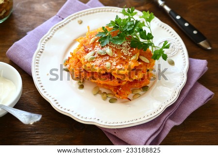 Pumpkin pancakes in a white plate, tasty food
