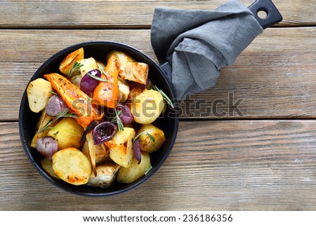 roasted pieces of vegetables in pan, food