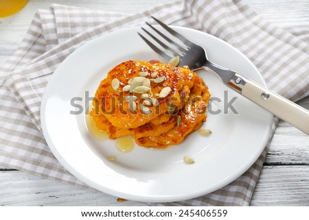 Pancakes with honey on a plate, fresh food