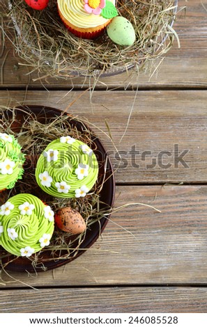 Easter cupcakes top view on boards