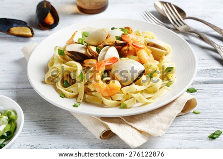 Spaghetti with seafood on a plate, food