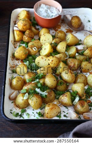 oven-baked young potatoes on baking dish