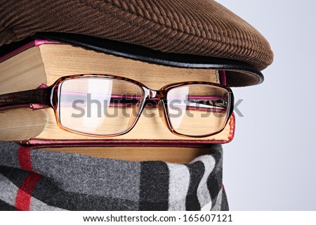 Burlesque Image Of The Detective: Books, Eyeglasses, A Scarf