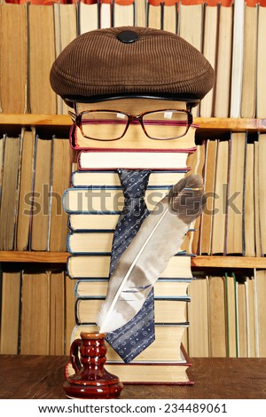 Unusual funny parody.Teacher with quill pen in library